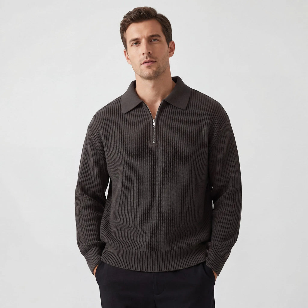 Man wearing a ribbed knit zip polo jumper in dark brown with a collar, front view with zip half undone