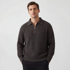 Man wearing a ribbed knit zip polo jumper in dark brown with a collar, front view with zip half undone