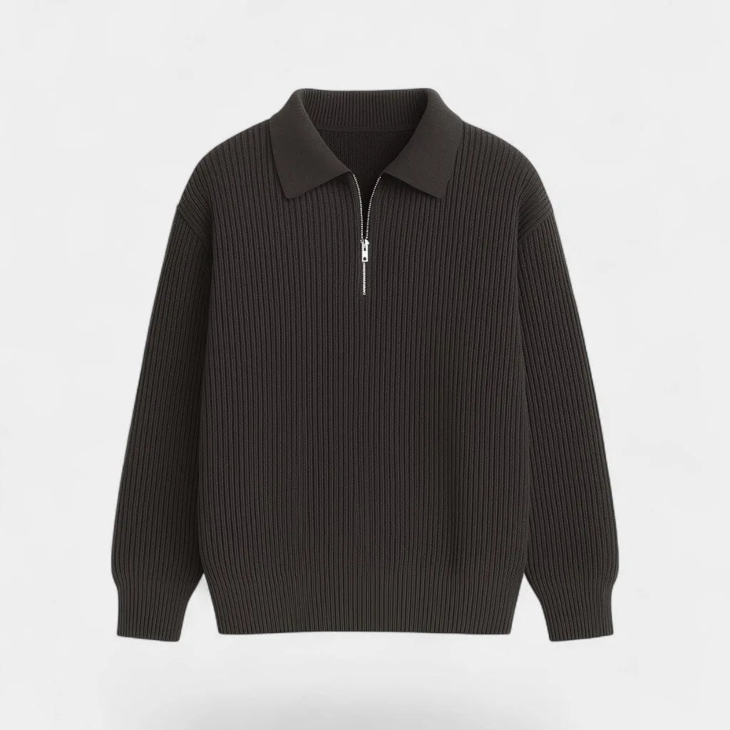 Flat lay of a dark brown ribbed knit zip polo jumper showing the collar and silver half-zip detail