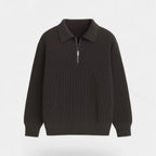 Flat lay of a dark brown ribbed knit zip polo jumper showing the collar and silver half-zip detail