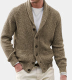 Khaki brown marl shawl-collar cardigan with ribbed knit texture and button placket, worn with cream trousers