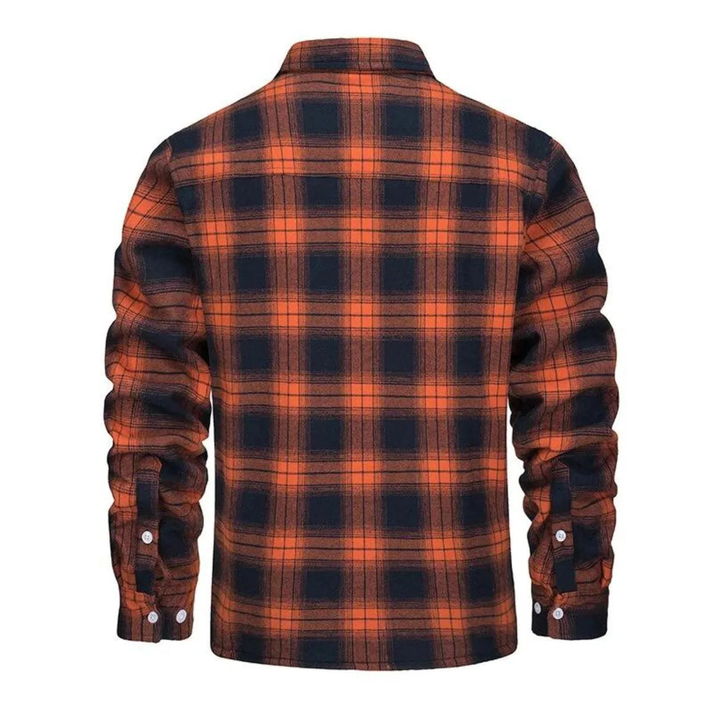 Back view of an orange and navy checked flannel shirt jacket with long sleeves