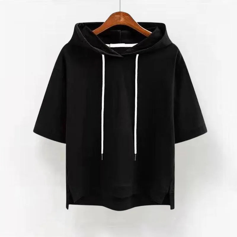 Black short-sleeve hoodie on a hanger, front view highlighting the banded cuffs and side vents