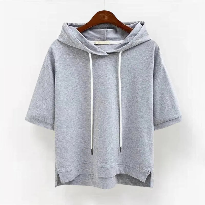 Grey marl short-sleeve hoodie on a hanger, close-up of the drawstring hood and dropped shoulders