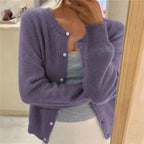 Purple button-front cardigan with round neckline, soft knit texture visible on the sleeves