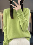 Pink knit jumper with ribbed round neckline and relaxed drop-shoulder sleeves