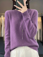 Soft mauve purple jumper showing the fine knit texture and ribbed crew neckline