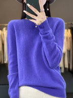 Vivid periwinkle blue jumper with dropped shoulders and ribbed wrist cuffs