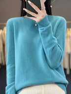 Sky blue knit jumper with a soft brushed finish and relaxed round neck