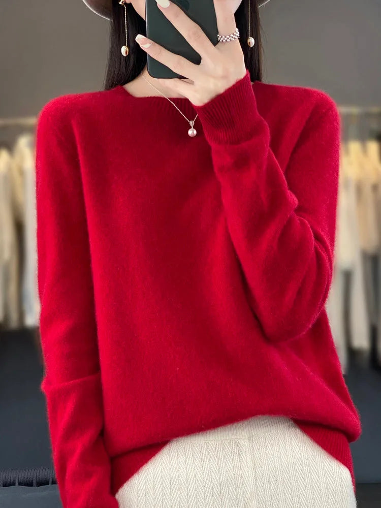 Deep red knit jumper with dropped shoulder seams and ribbed hem