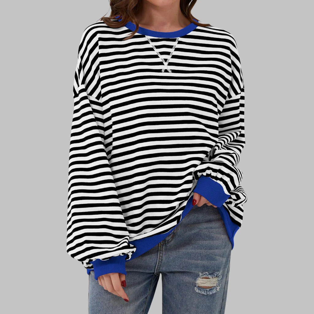 Front view of black and white striped sweatshirt with contrasting royal blue ribbed collar and cuffs