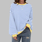 Front view of sky blue and white striped sweatshirt with contrasting soft yellow ribbed collar and cuffs