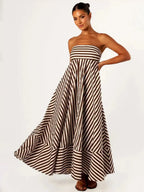 Front view of the strapless striped maxi dress on a plain background, showing the fitted bodice and flared skirt
