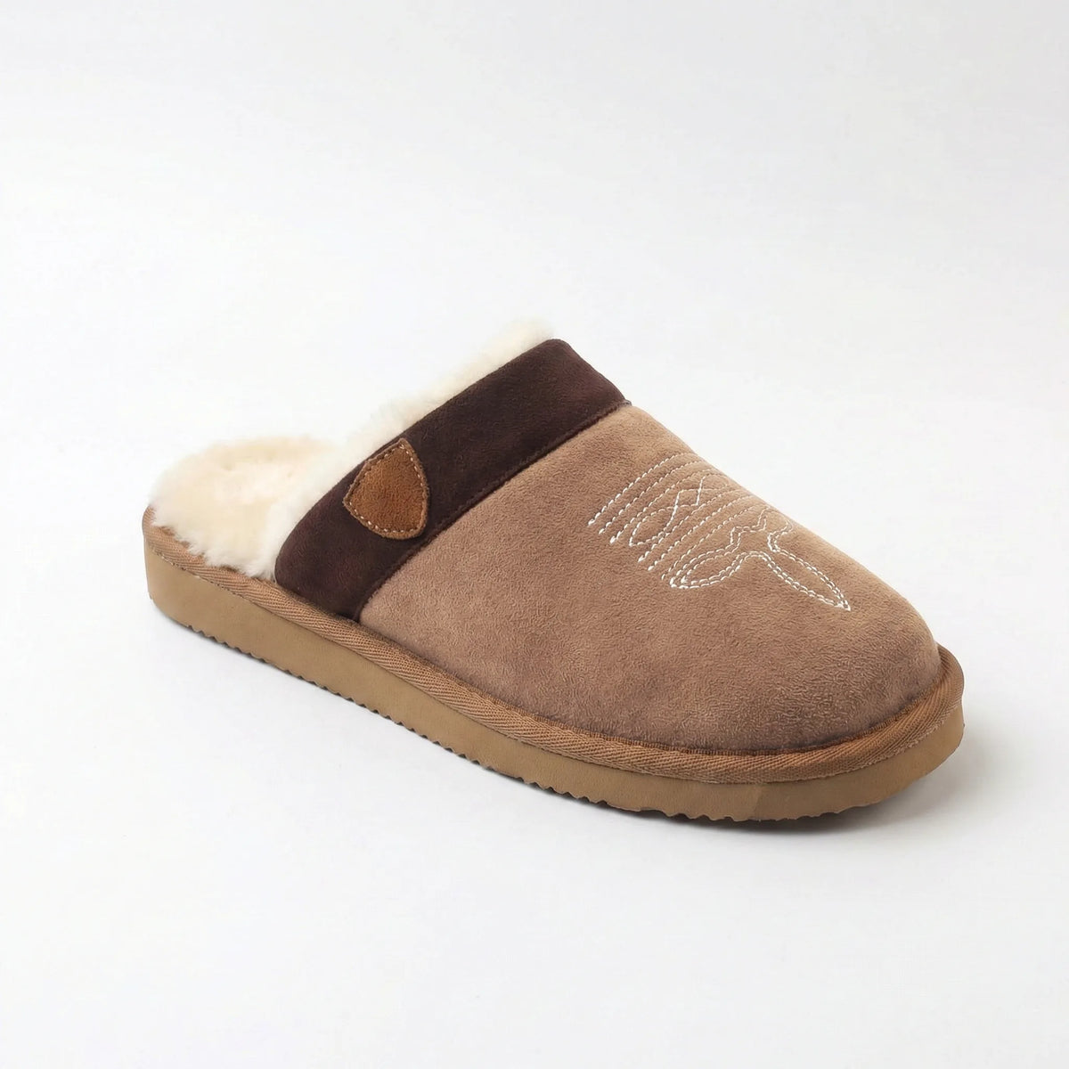 Three-quarter view of chestnut suede mule slipper with western stitched toe detail