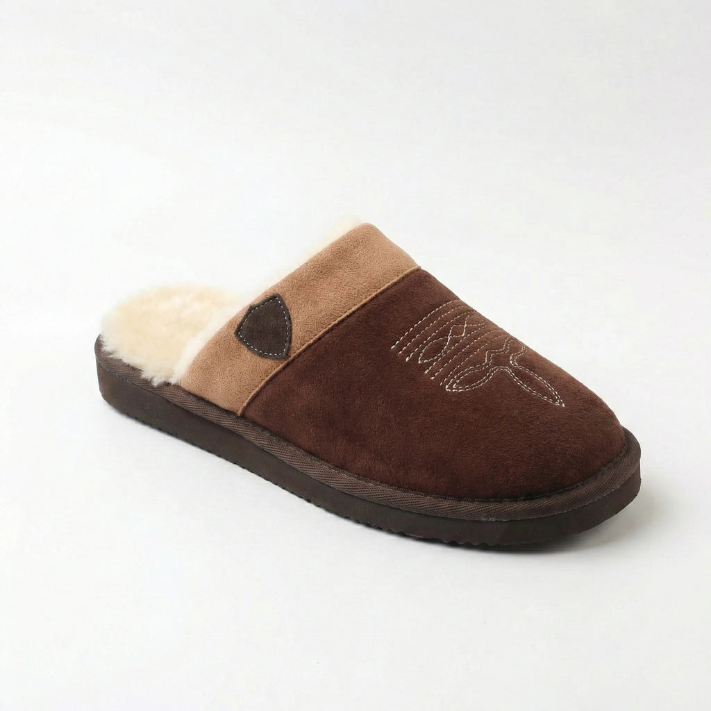 Three-quarter angle of dark brown suede slipper with tan cuff and stitched western design