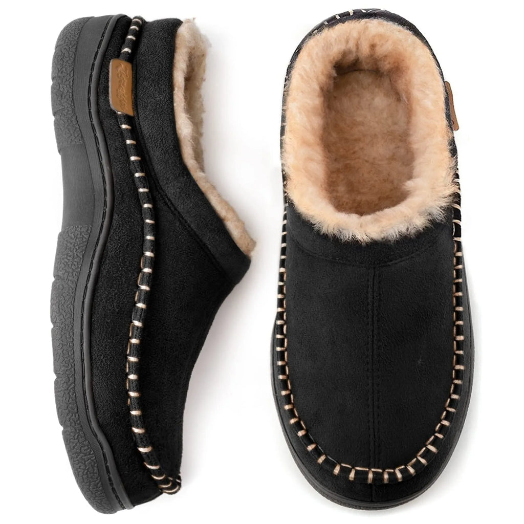 Top and side view of black suede moccasin-style slippers with tan faux fur lining and whipstitch trim