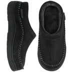 Top and side view of all-black slippers with matching suede lining and dark whipstitch trim
