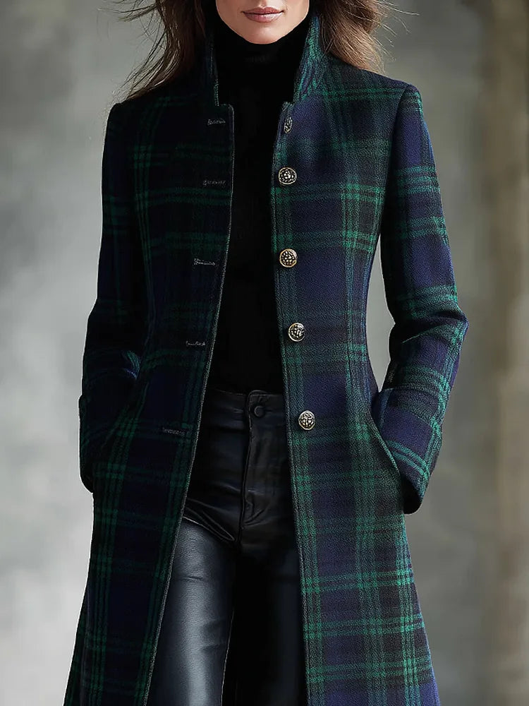 Close-up of the tartan wool-blend coat showing the stand collar, gold button detailing and slim tailored fit