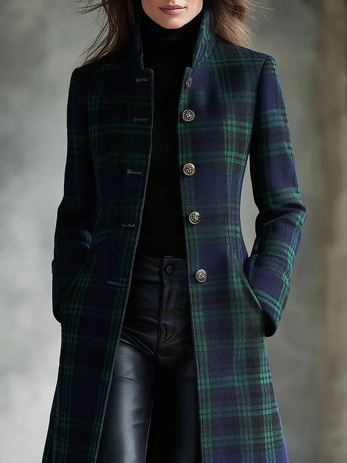 Close-up of the tartan wool-blend coat showing the stand collar, gold button detailing and slim tailored fit