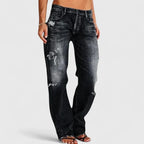 Front view of black washed distressed denim trousers with faded fading and ripped detailing