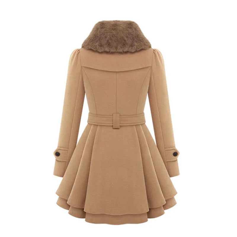 Back view of camel coat showing belted waist, fur collar and layered ruffled hem