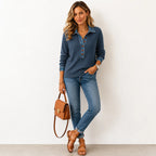 Model in a slate blue waffle knit henley jumper featuring denim collar, cuffs and wooden-style buttons, worn with skinny jeans