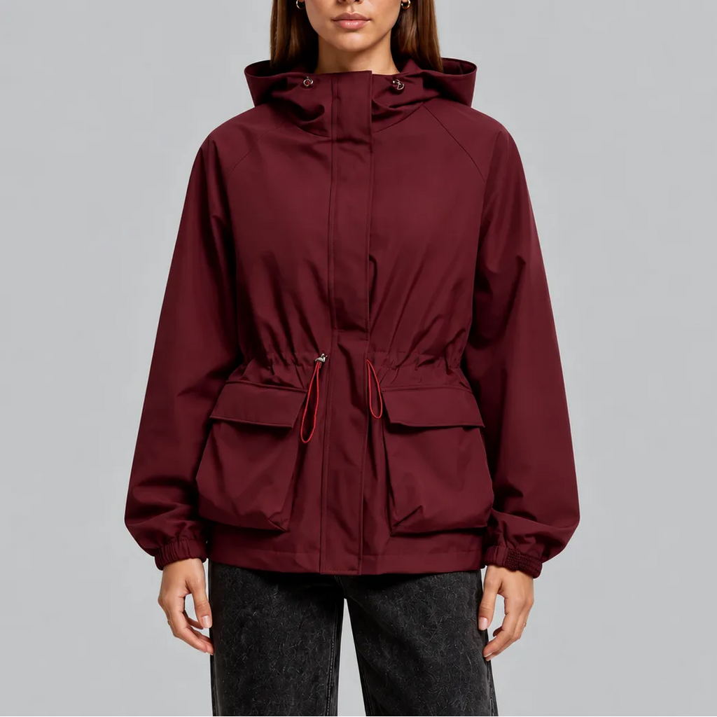 Close-up front view of a burgundy hooded jacket with contrast red drawstring cords at the waist
