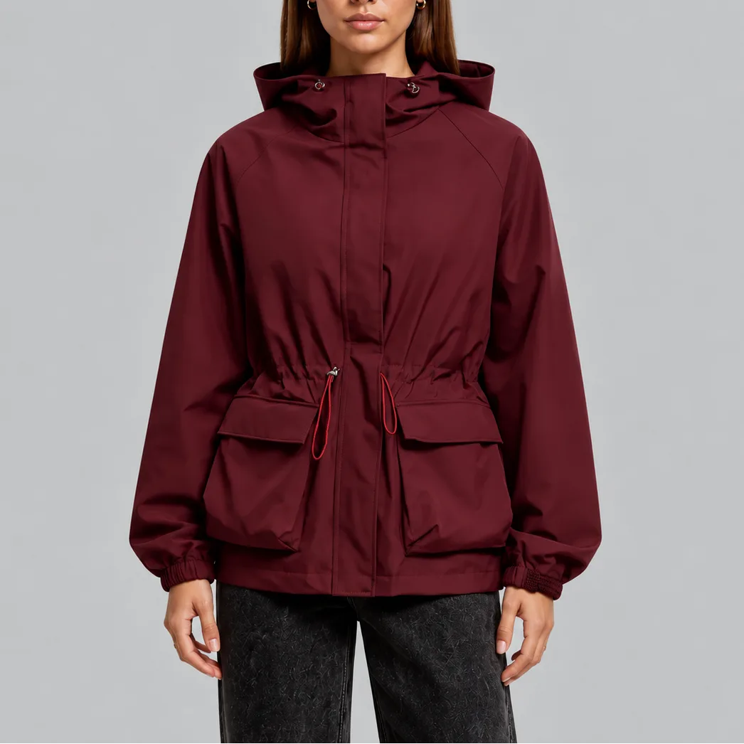 Close-up front view of a burgundy hooded jacket with contrast red drawstring cords at the waist
