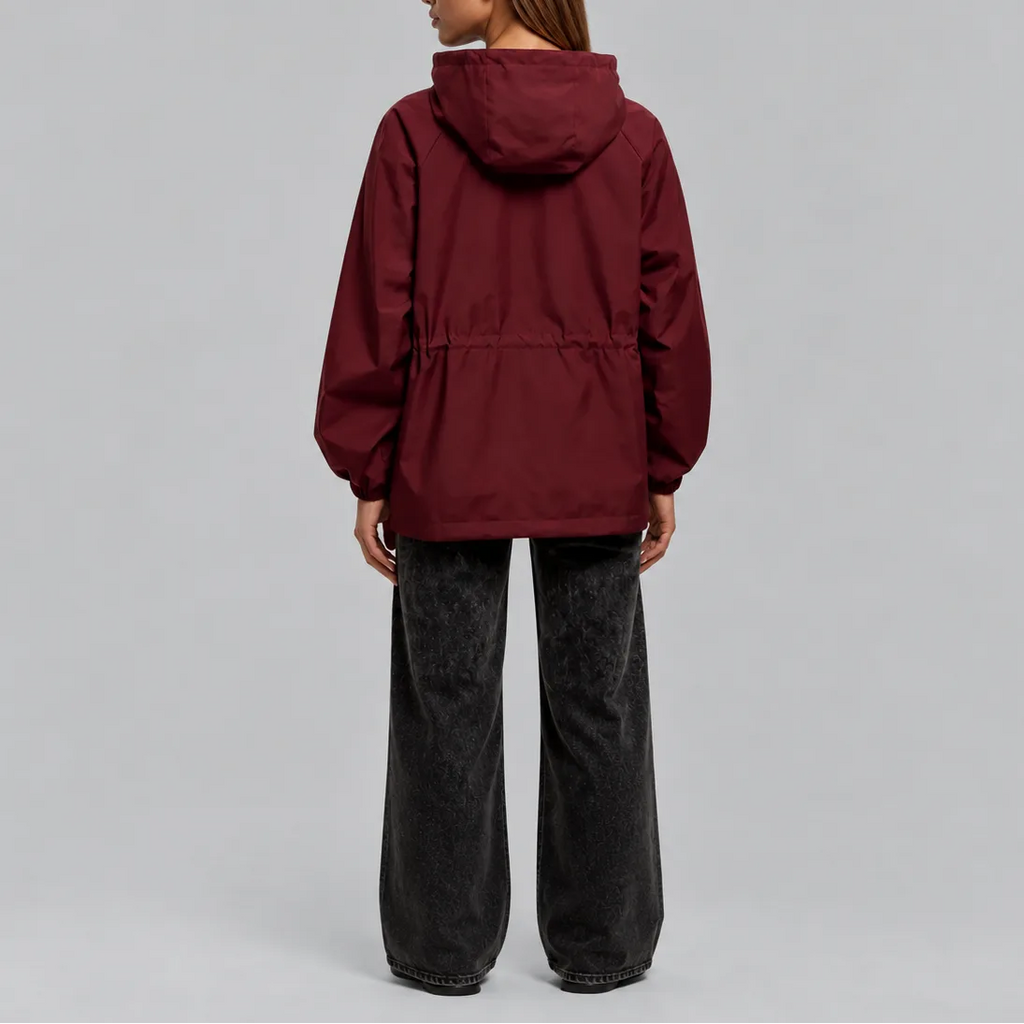 Back view of the burgundy jacket showing the hood, straight hem and relaxed fit