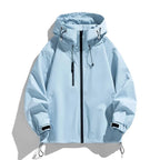 Front view of a light blue hooded windbreaker jacket with full zip, drawstring hood and chest pocket zip