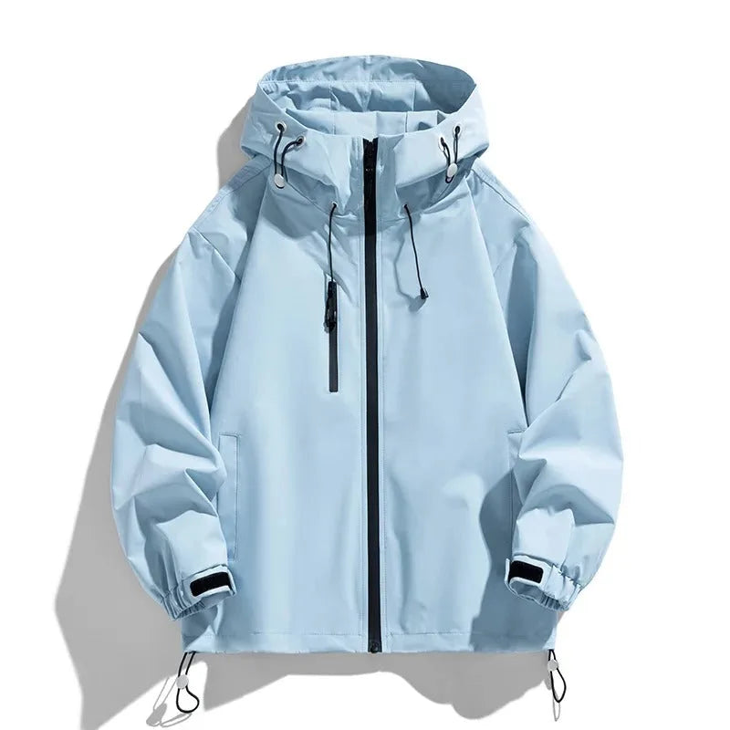 Front view of a light blue hooded windbreaker jacket with full zip, drawstring hood and chest pocket zip