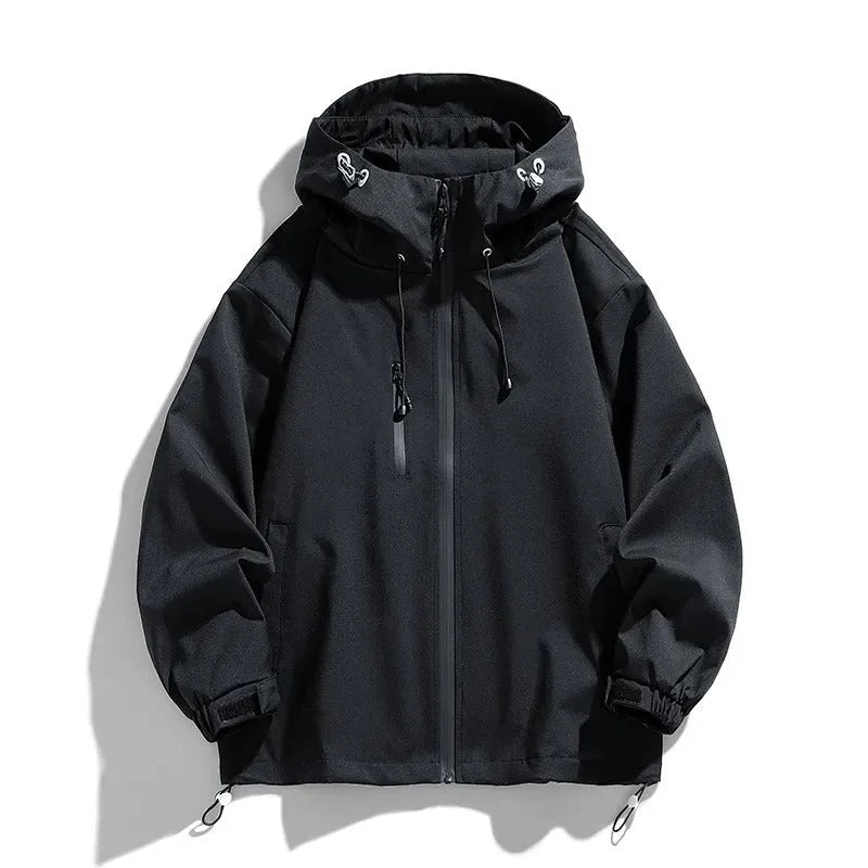 Front view of a black hooded jacket with zip fastening, drawstring hood and side pockets