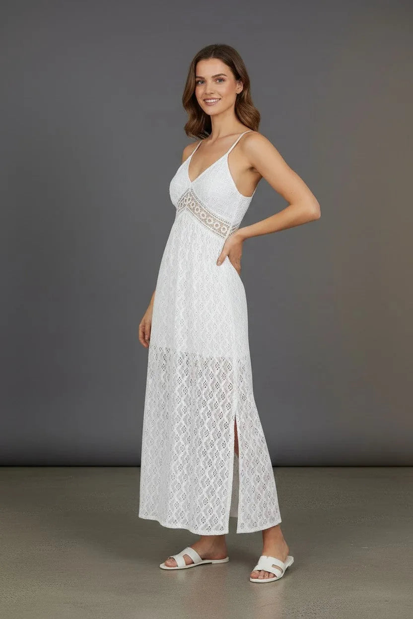 Close side angle of the white lace maxi dress highlighting the fitted empire waist and delicate crochet-style texture