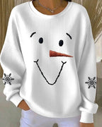 Front view of a white ribbed sweatshirt with an embroidered smiling snowman face and dropped shoulders