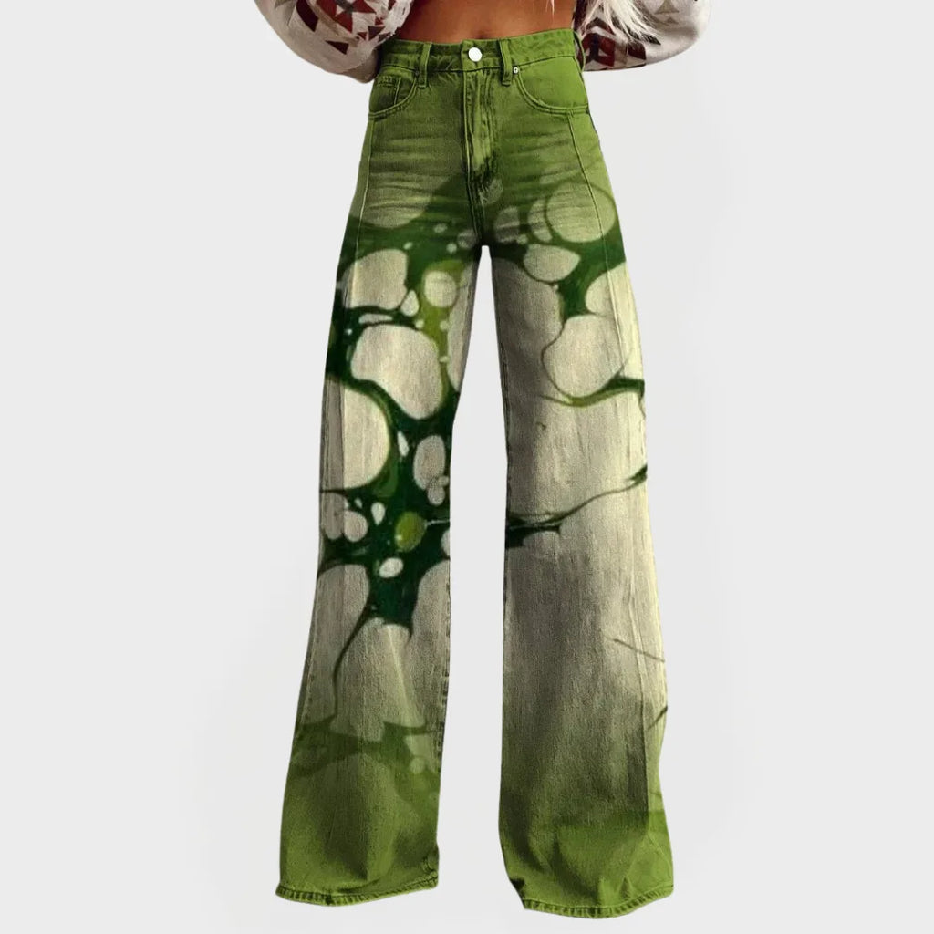 Front view of high-waisted wide-leg green tie-dye jeans with an abstract marbled pattern and button fly.