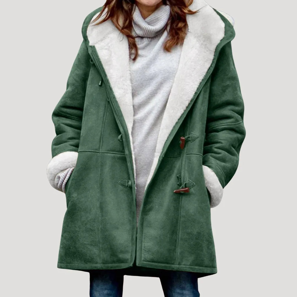 Front view of a green faux suede hooded duffle coat with cream borg-style fleece lining and toggle fastenings