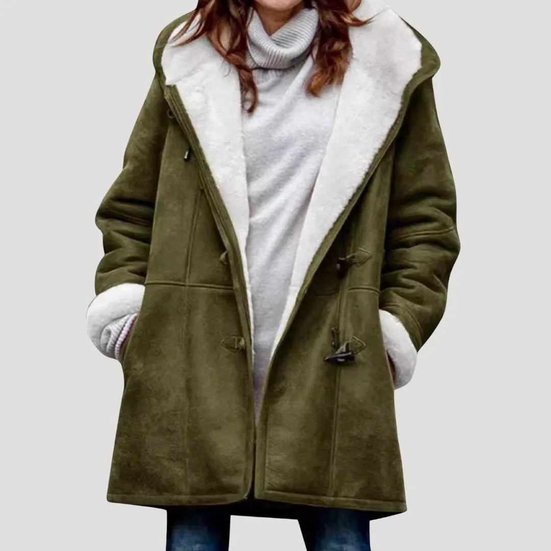 Close-up front view of a dark green duffle coat showing the toggle fasteners and plush fleece-lined hood