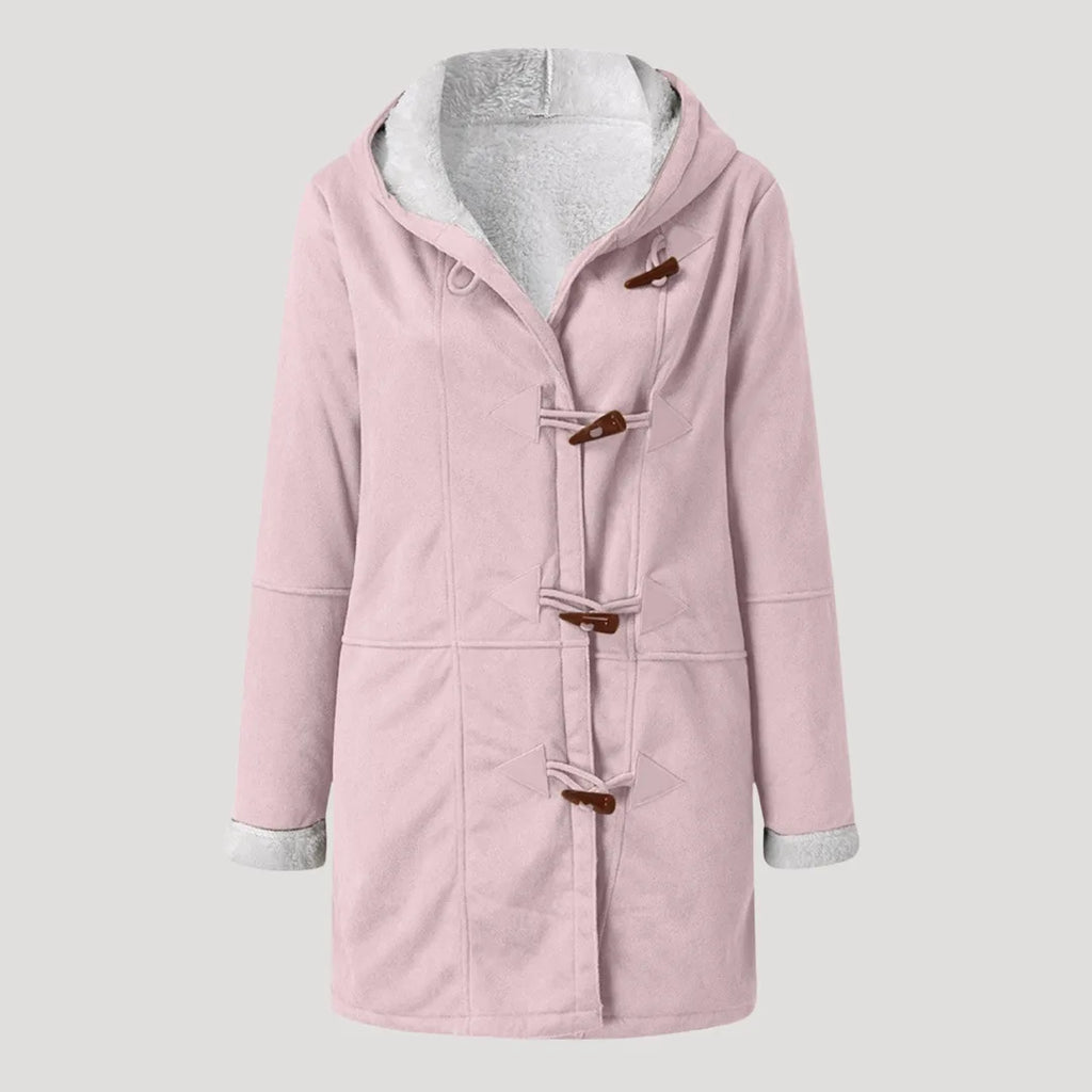 Flat lay of a pale pink duffle coat with grey fleece-lined hood and cuffs, fastened with toggle closures