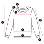 Detail shot of cream knit fabric showing dropped shoulder seam and sleeve construction