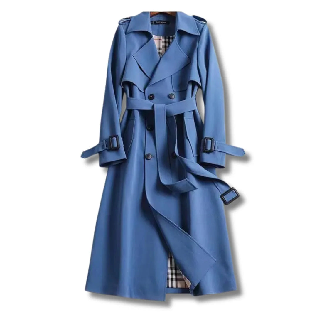 Slate blue trench coat with wide lapels, epaulettes and self-tie belt, front view on hanger
