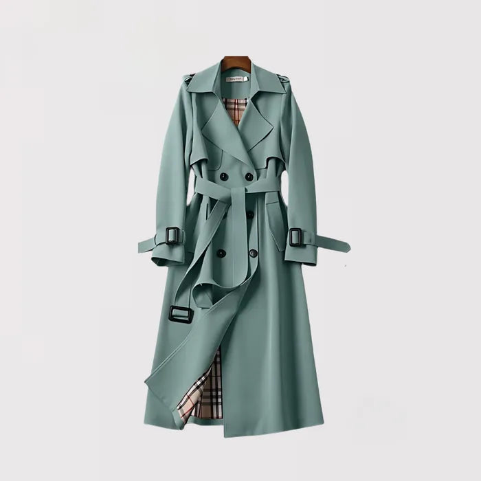 Sage green trench coat with double-breasted buttons and buckled cuff straps, front view