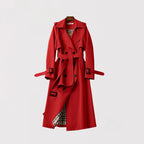 Red double-breasted trench coat with wide collar and self-tie waist belt, front view