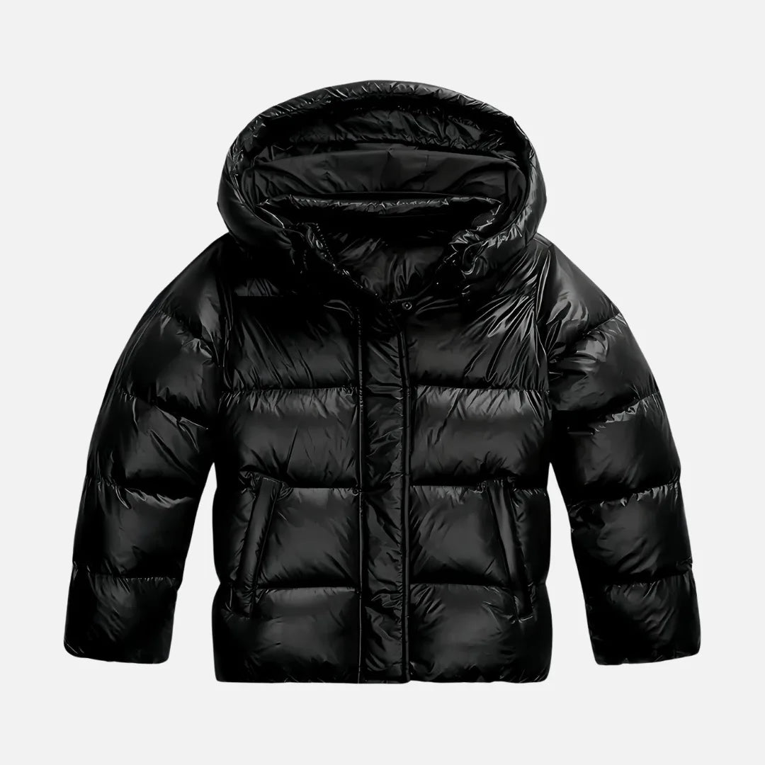 Flat lay of the black glossy puffer jacket with hood, front zip and welt pockets, no model