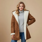 Front view of a tan brown duffle coat with cream fleece lining, hood and toggle fastenings worn open