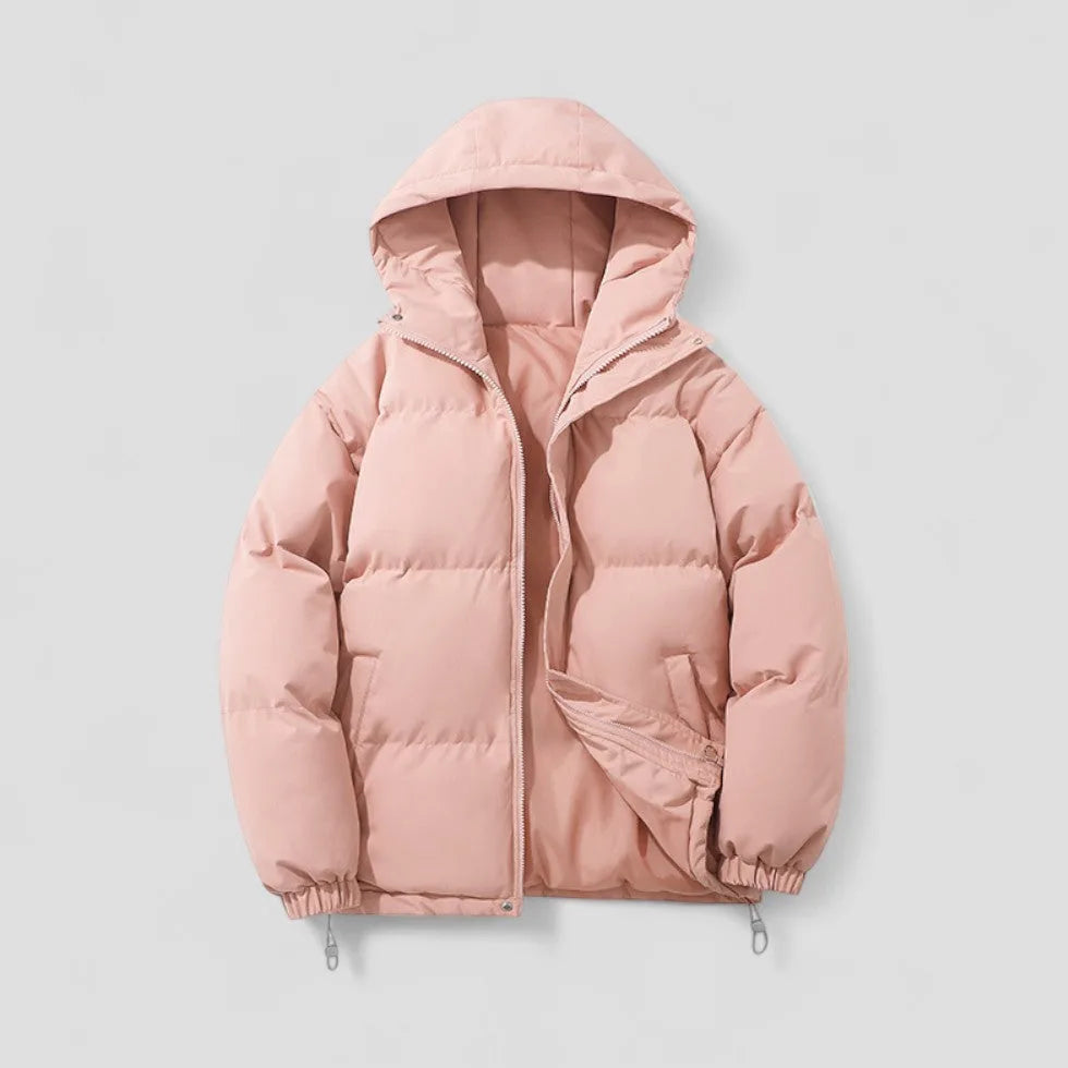 Pink hooded puffer jacket laid flat, showing drawstring hem, chunky zip and quilted panel construction
