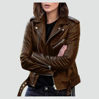 Front view of a brown leather biker jacket with asymmetric zip, silver studs and waist belt