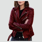 Burgundy wine leather biker jacket with ribbed cuffs, zipped sleeve detail and tie waist belt