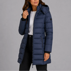 Front view of a navy quilted longline puffer jacket worn open over a white t-shirt with the hood up