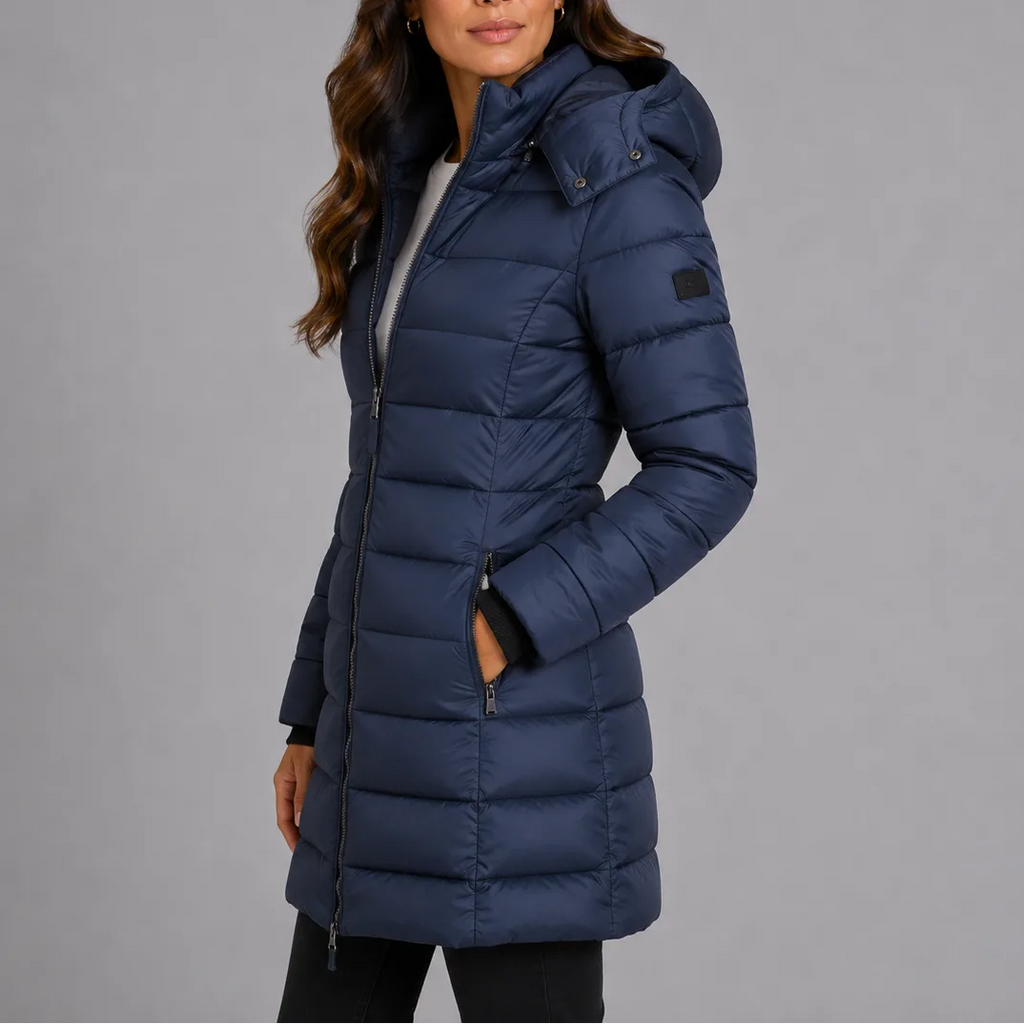 Side profile of the navy hooded puffer coat showing the fitted waist and zip side pocket