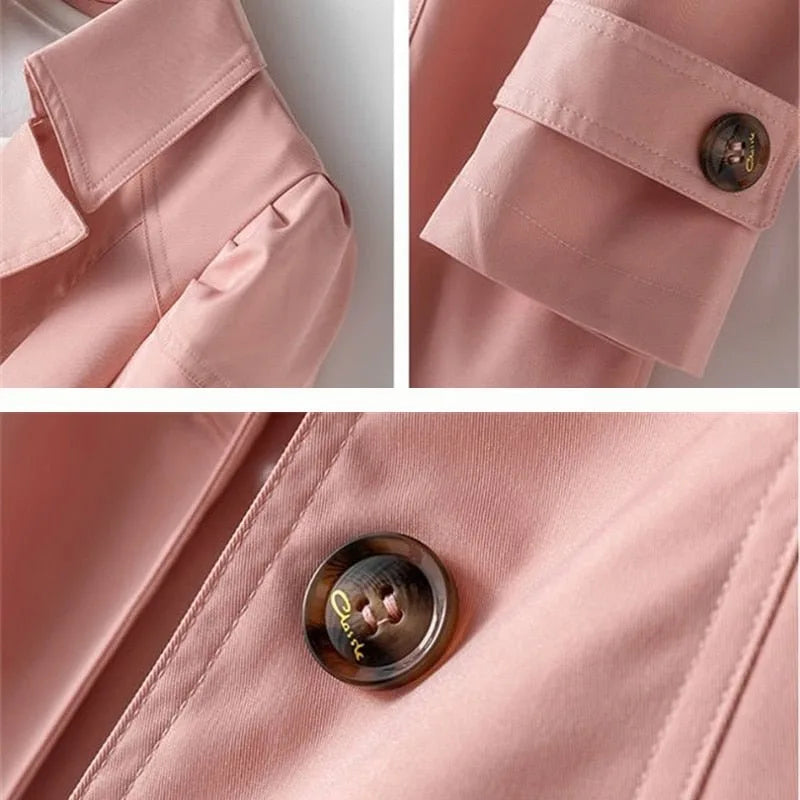 Close-up details of a pink trench coat showing the collar, cuff strap with button, and tortoiseshell-effect button
